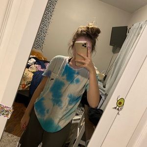 Pink tye dye tee shirt.